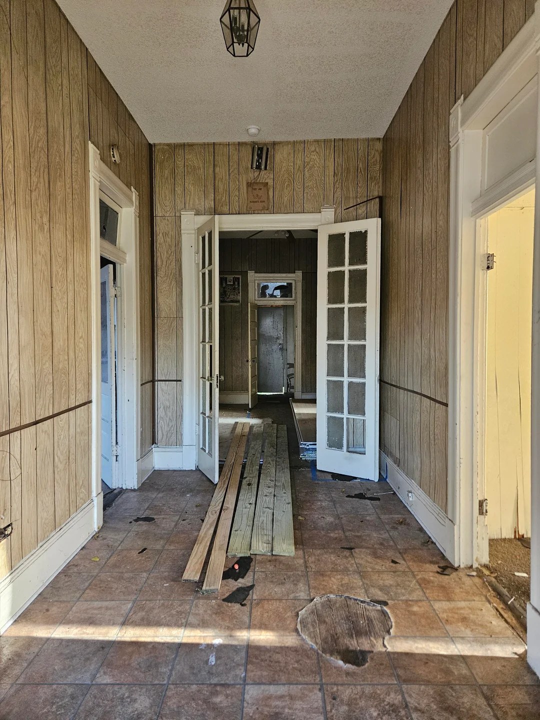 Interior remodeling work with exposed walls and floor preparation